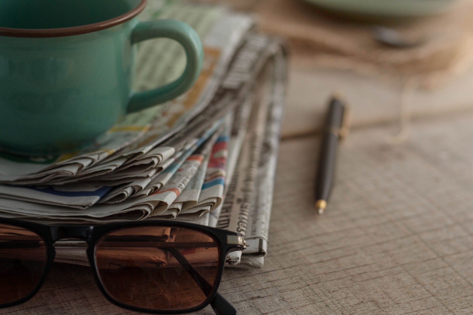 Newspapers on wooden boards
